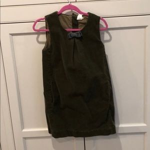 Cute olive corduroy jumper w/front bow & back zip.